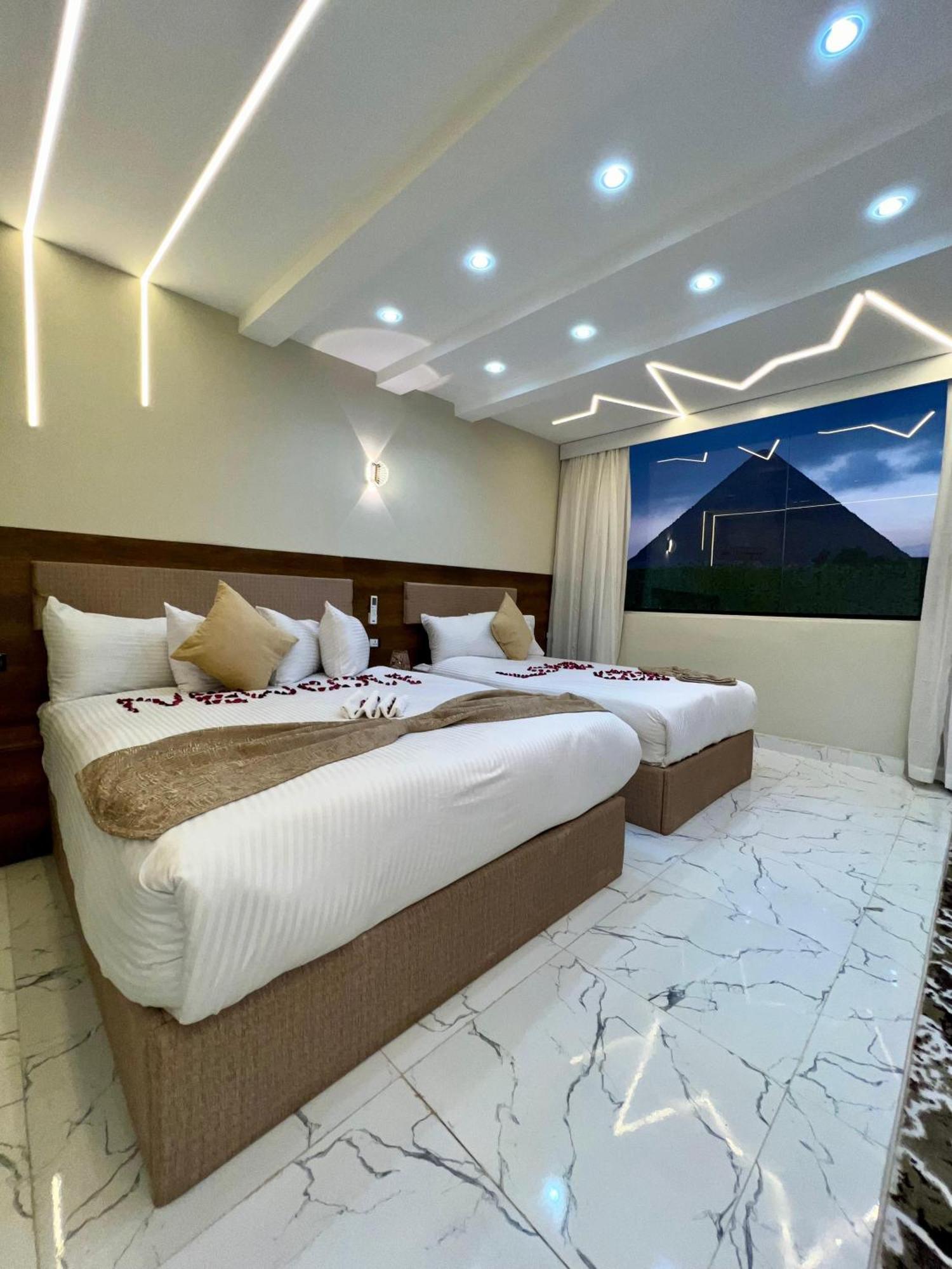 New Golf Pyramids View Hotell Kafret el-Gabal Exteriör bild