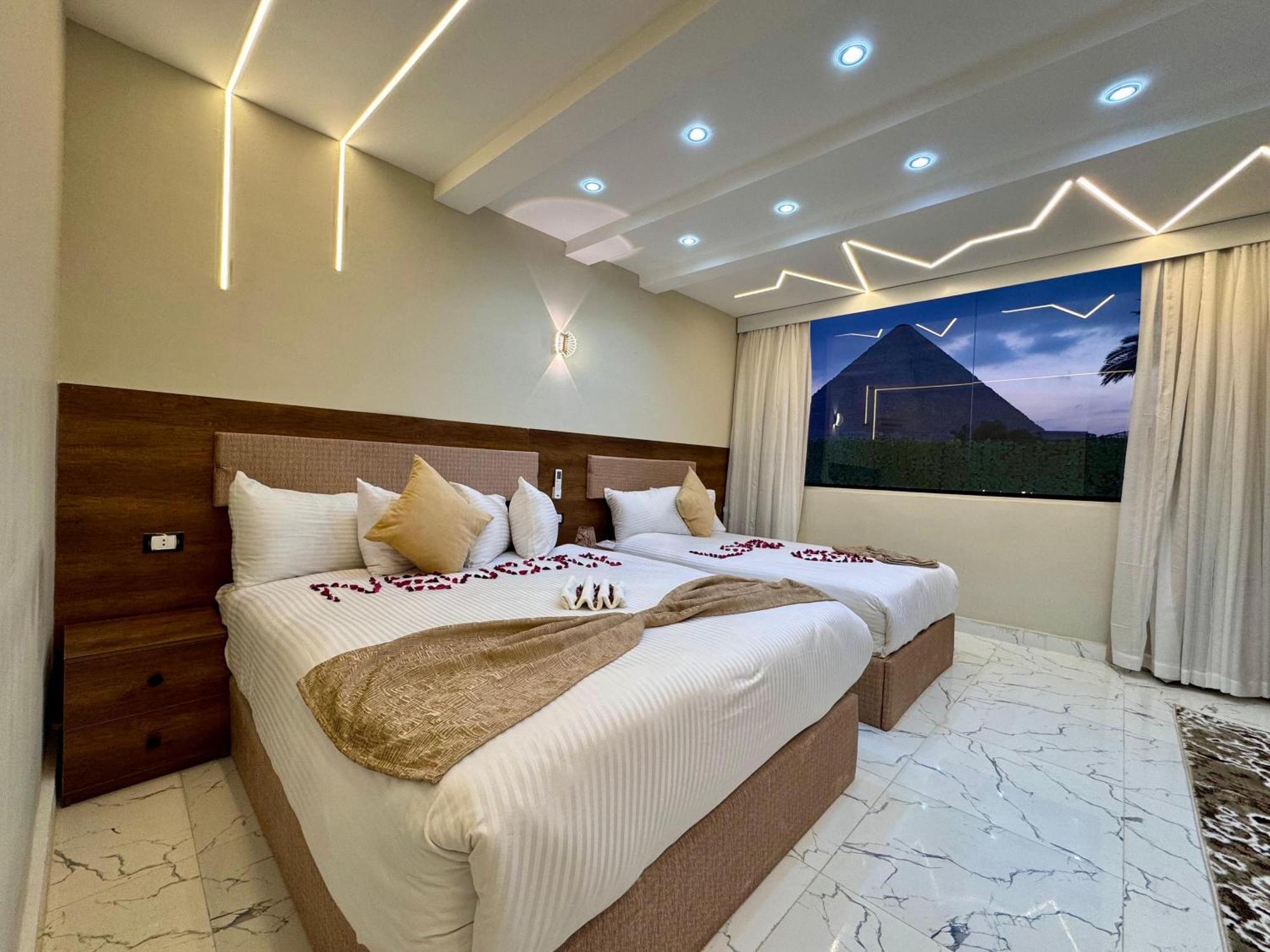 New Golf Pyramids View Hotell Kafret el-Gabal Exteriör bild