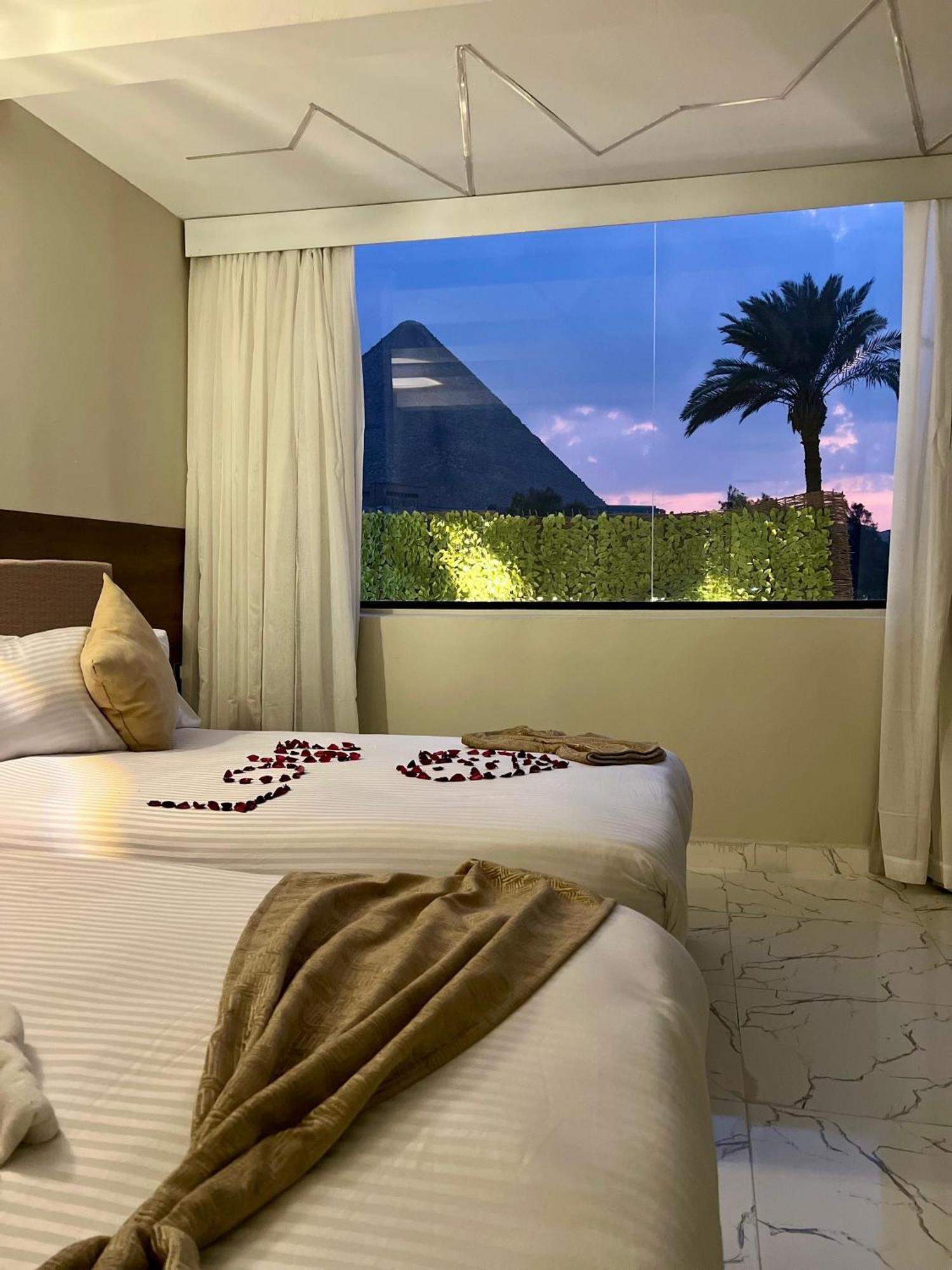 New Golf Pyramids View Hotell Kafret el-Gabal Exteriör bild