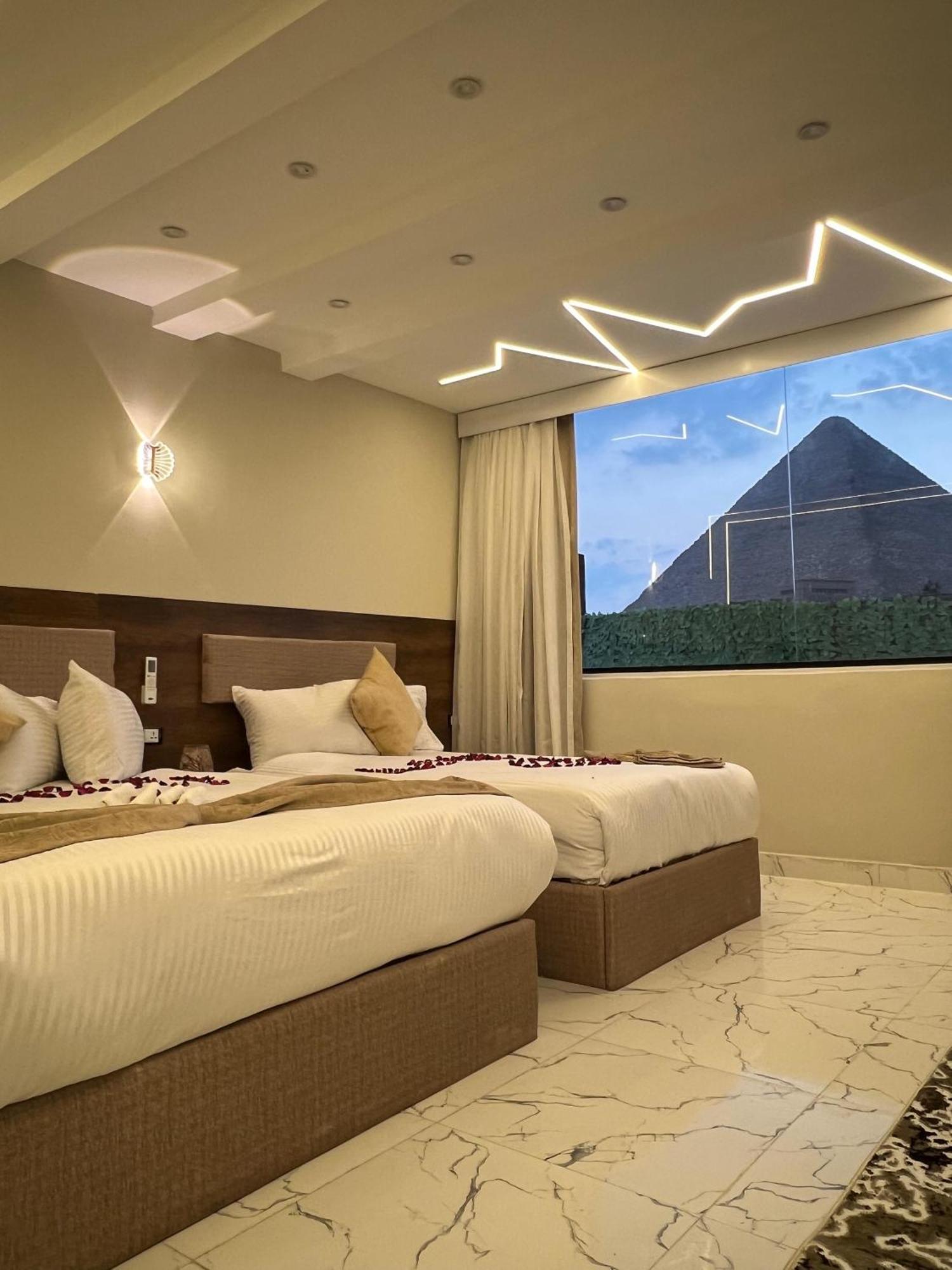 New Golf Pyramids View Hotell Kafret el-Gabal Exteriör bild